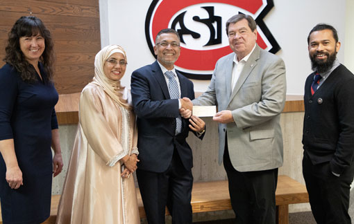 Elias & Sultana Founders presenting a grant to St. Cloud University